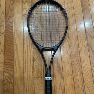 Tennis racquet with brand new strings
